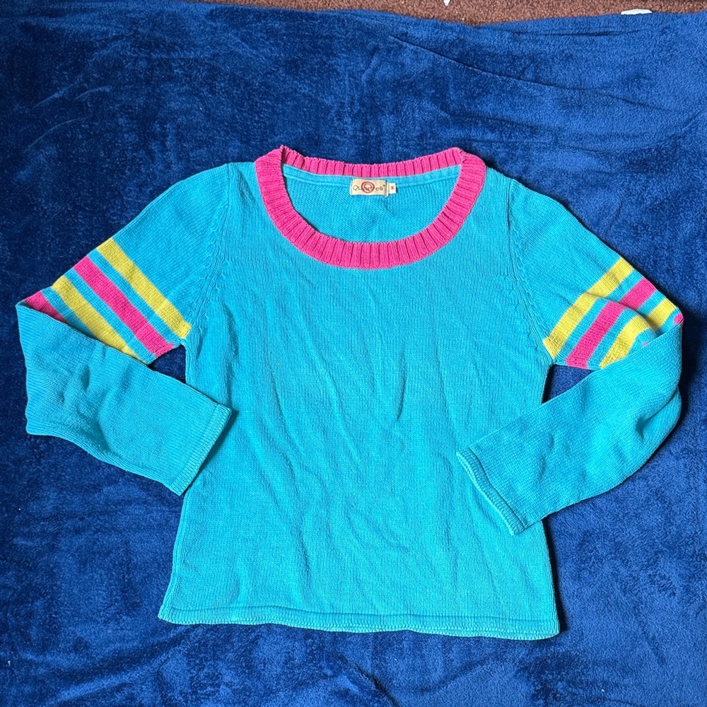 Vibrant Blue Sweater with Pink and Yellow Accents